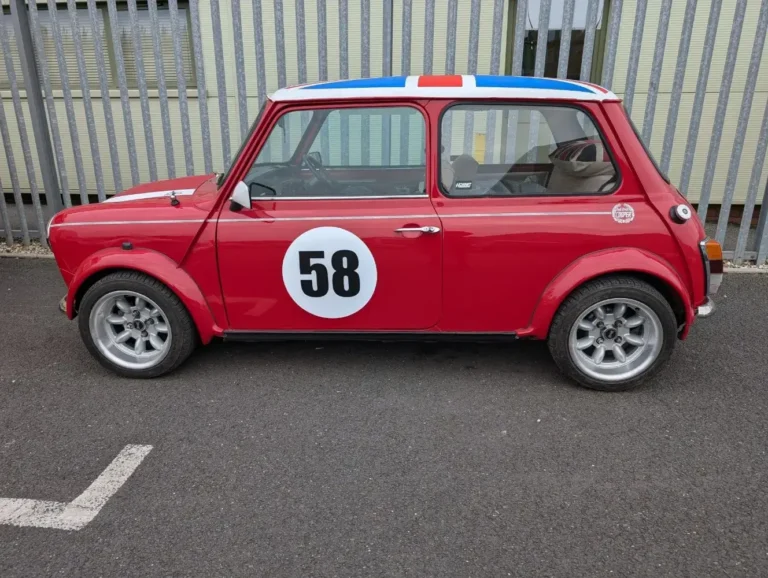 Classic Mini Cooper replica with racing livery restored by Trickett Welding Ltd