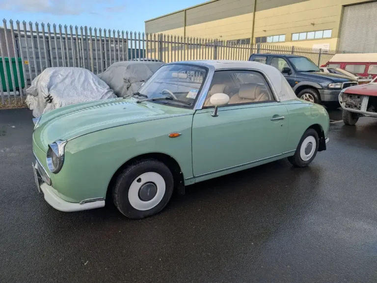 Mint green Nissan Figaro classic convertible restored by Trickett Welding Ltd