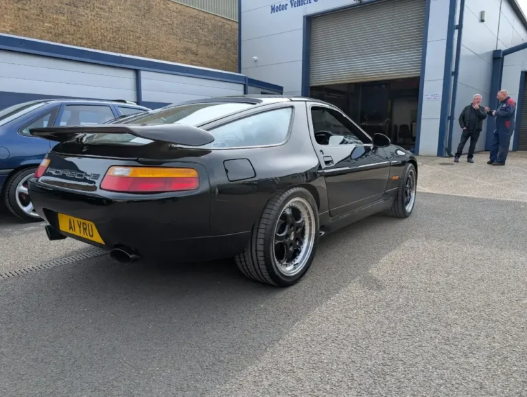 Black Porsche 928 classic sports car restoration by Trickett Welding Ltd